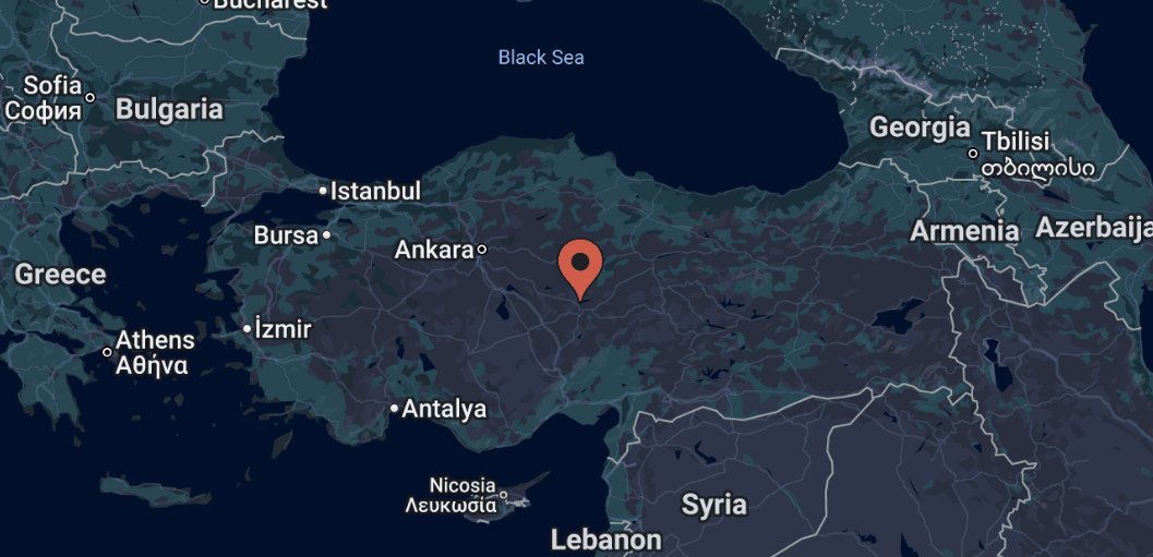 A dark map of Turkey with a red pin in central Anatolia